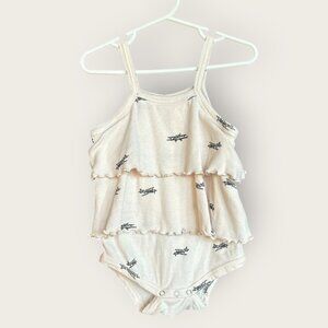 Kate Quinn skirted onesie planes